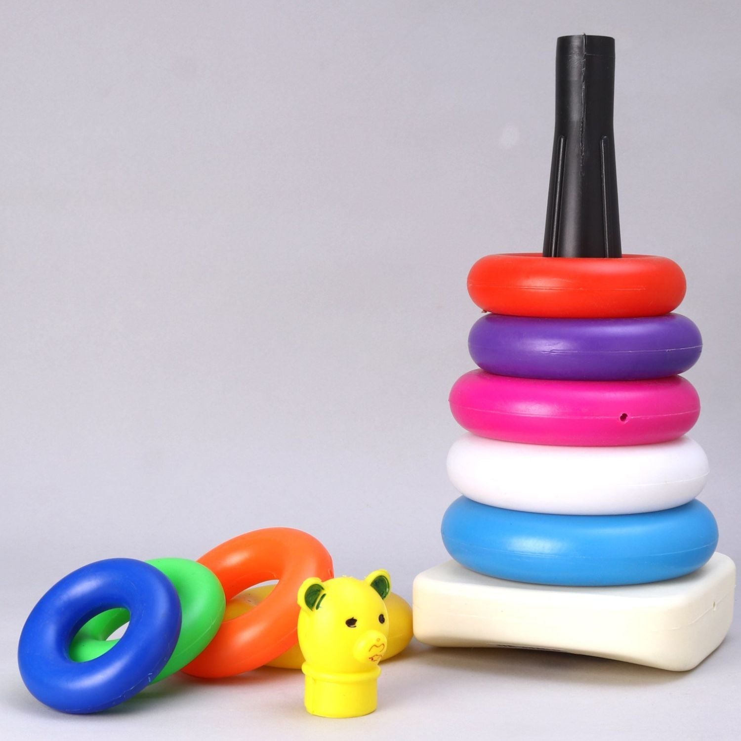 Educational stacking toy with teddy bear rings in various colors Educational stacking toy with teddy bear rings in various colors